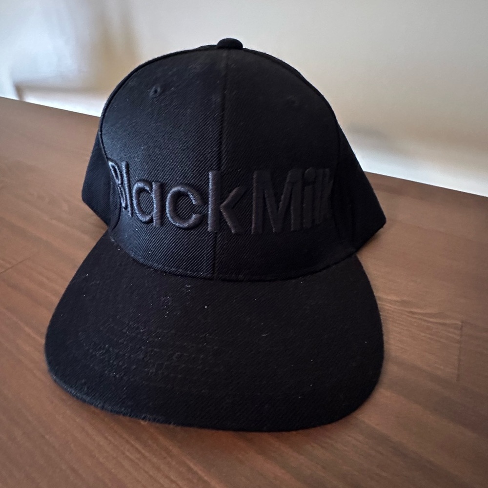 BlackMilk Black purple galaxy print baseball trucker hat.